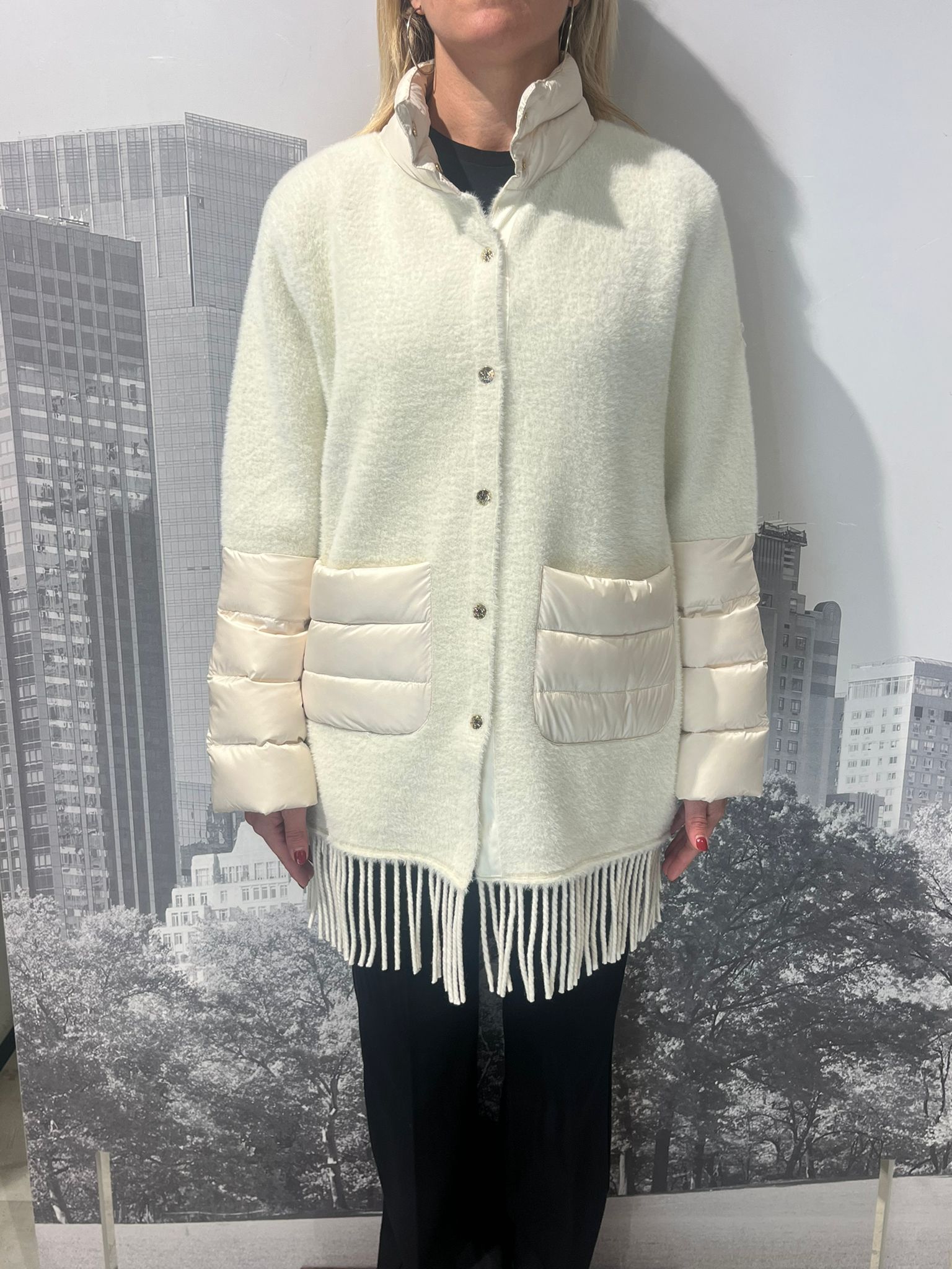 Piumino maglia e frange